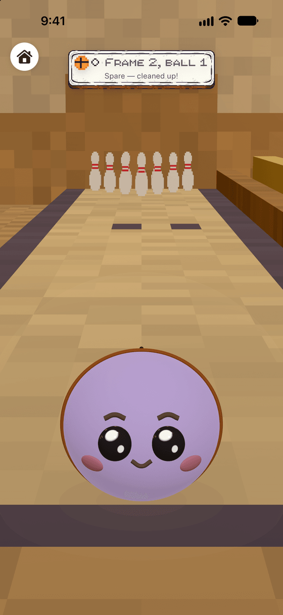 He IS the ball — mid-lane at the pins, on the bowling lane in his gym